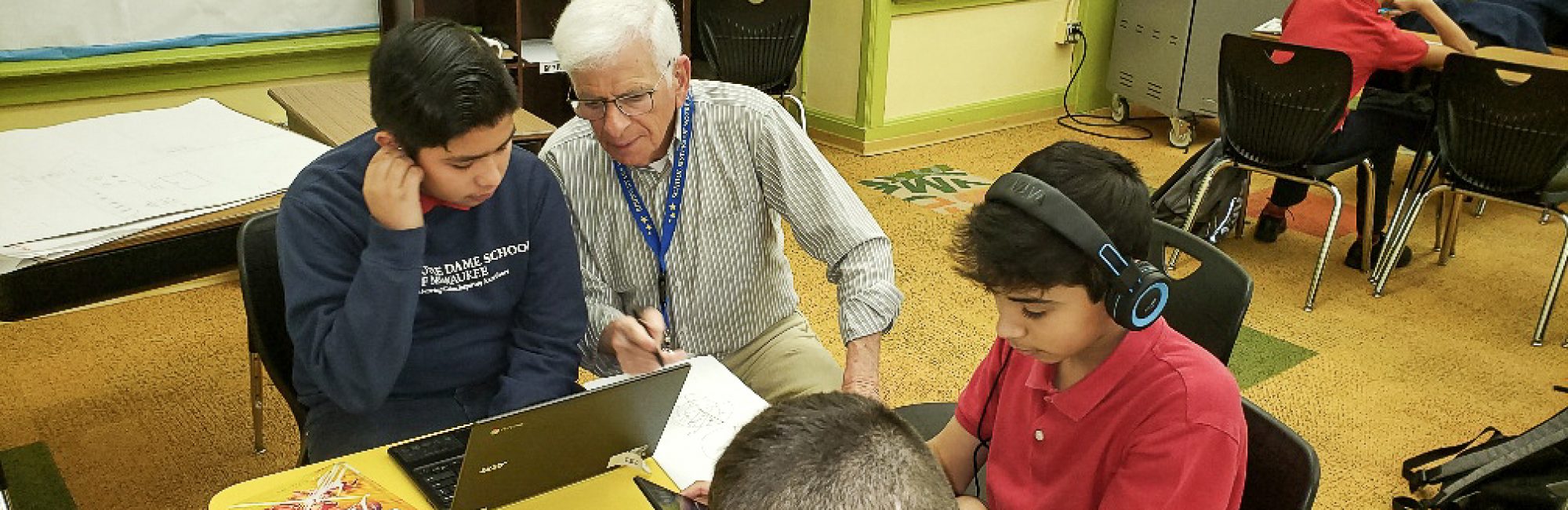 Chuck Mazza tutors a Notre Dame School of Milwaukee student in math.